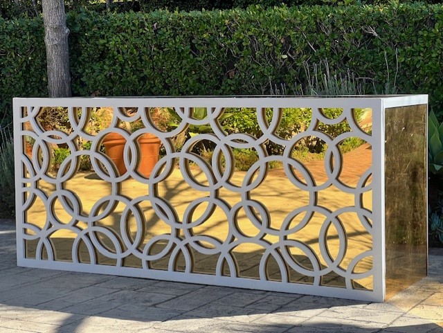 Gold mirror bar outdoors